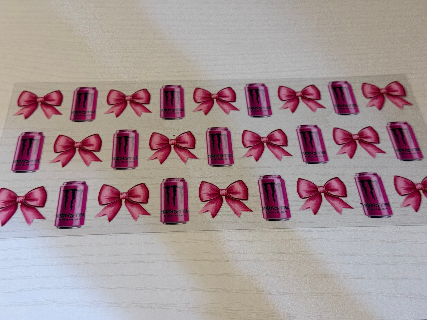 Pink bows and monster energy drink
