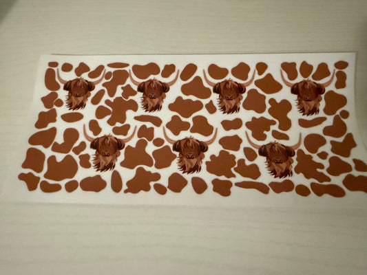 Brown highland cow and cow skin